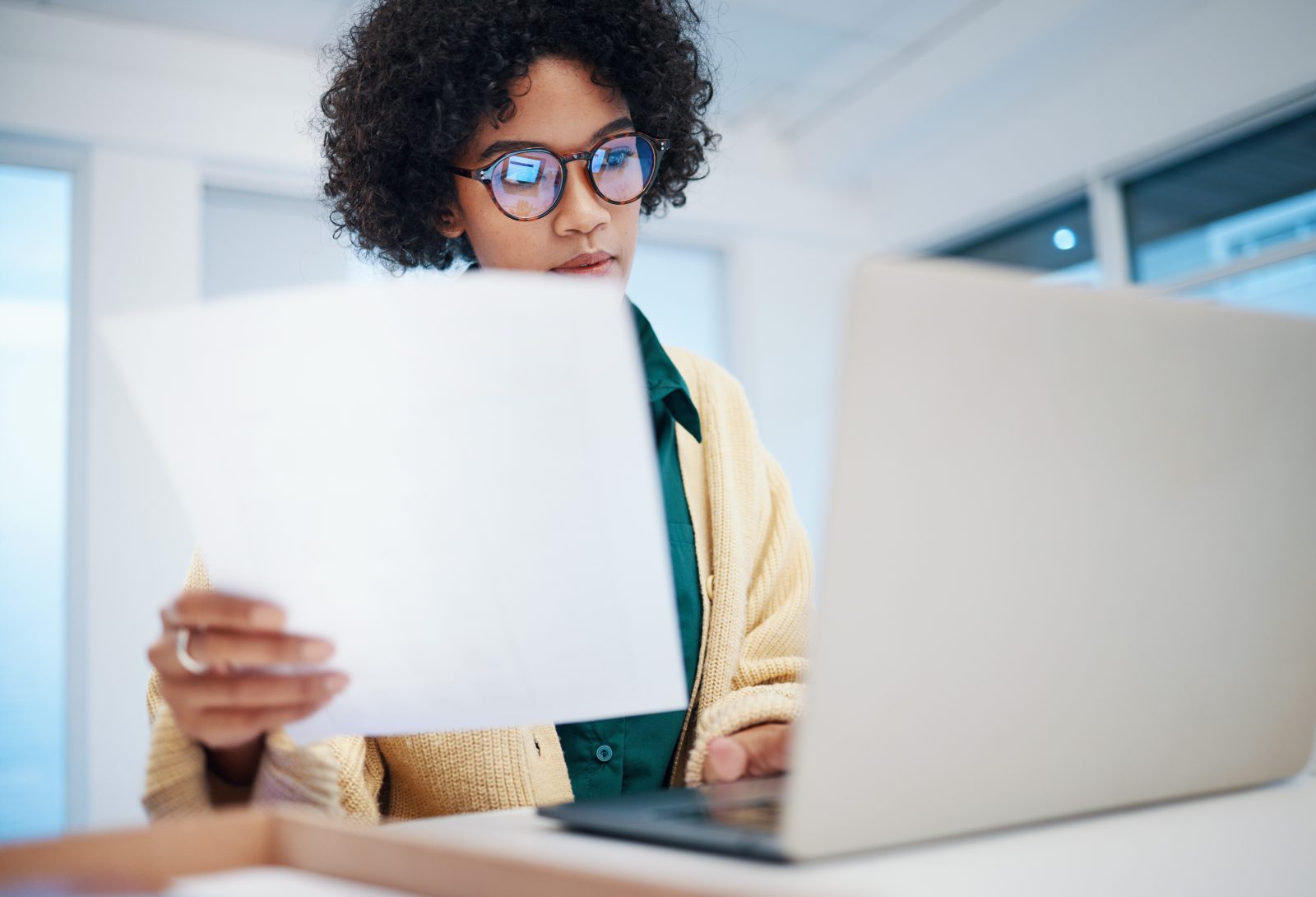Woman doing research on a laptop