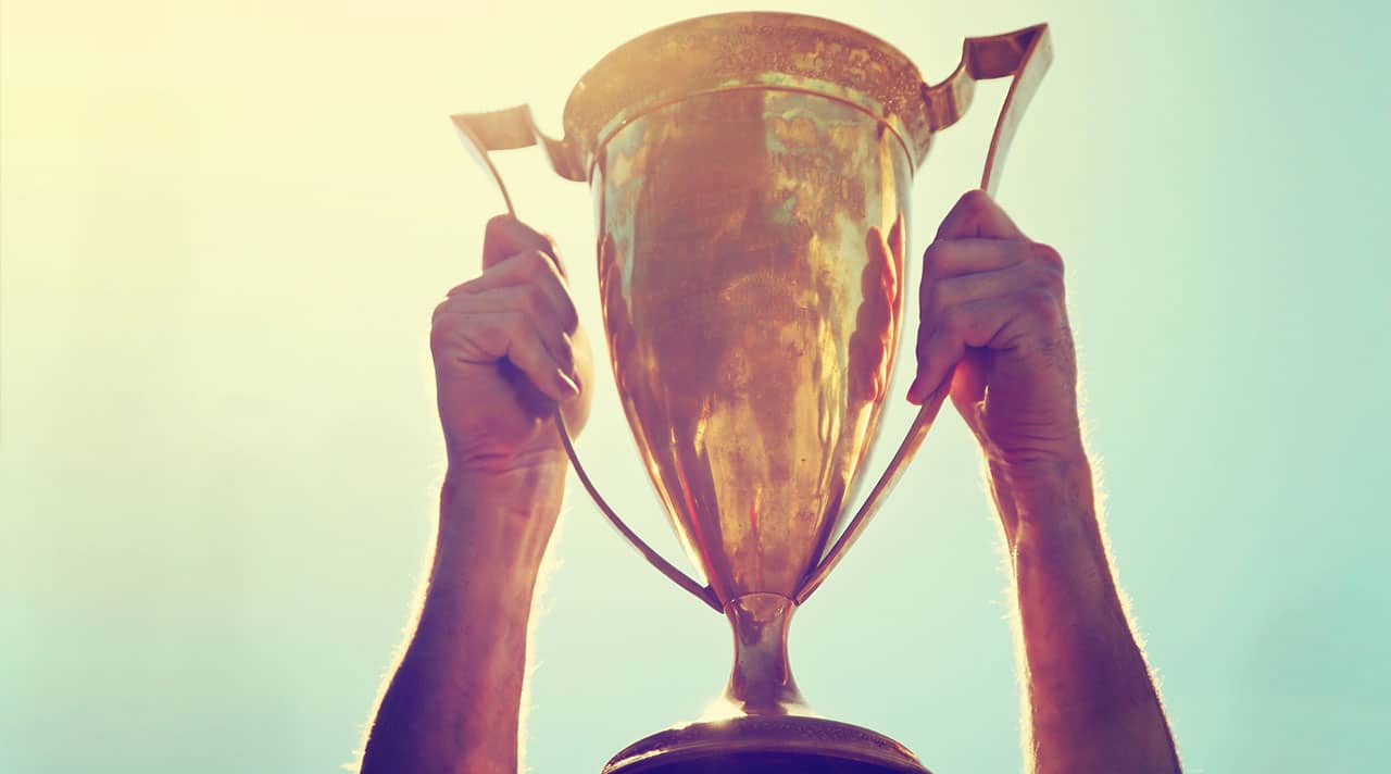 Sports Trophy being held high